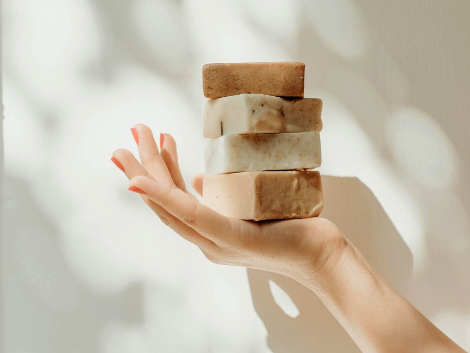 before: soap help by model with regular background
