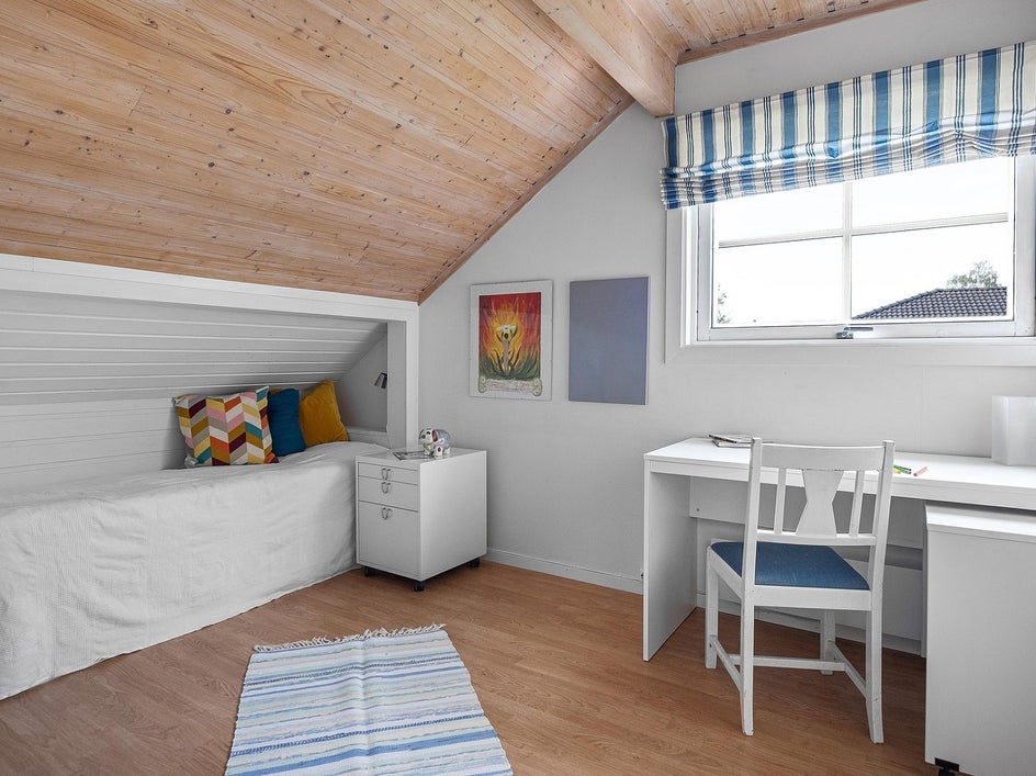 Before: Indoor attic room with various clutter