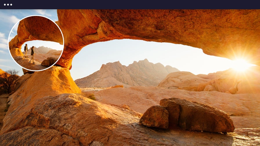 Desert arch at sunset with people removed using object remover tool.